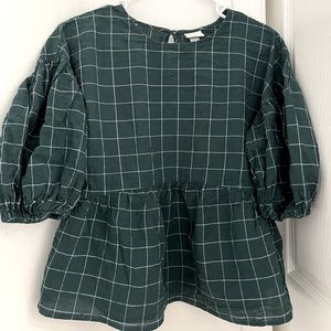 A green checked -Babydoll top